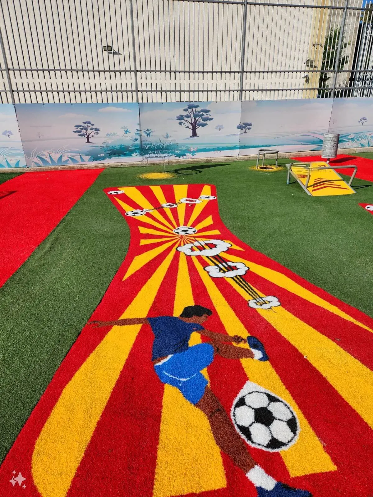 Football-themed turf with a player and sunburst rays